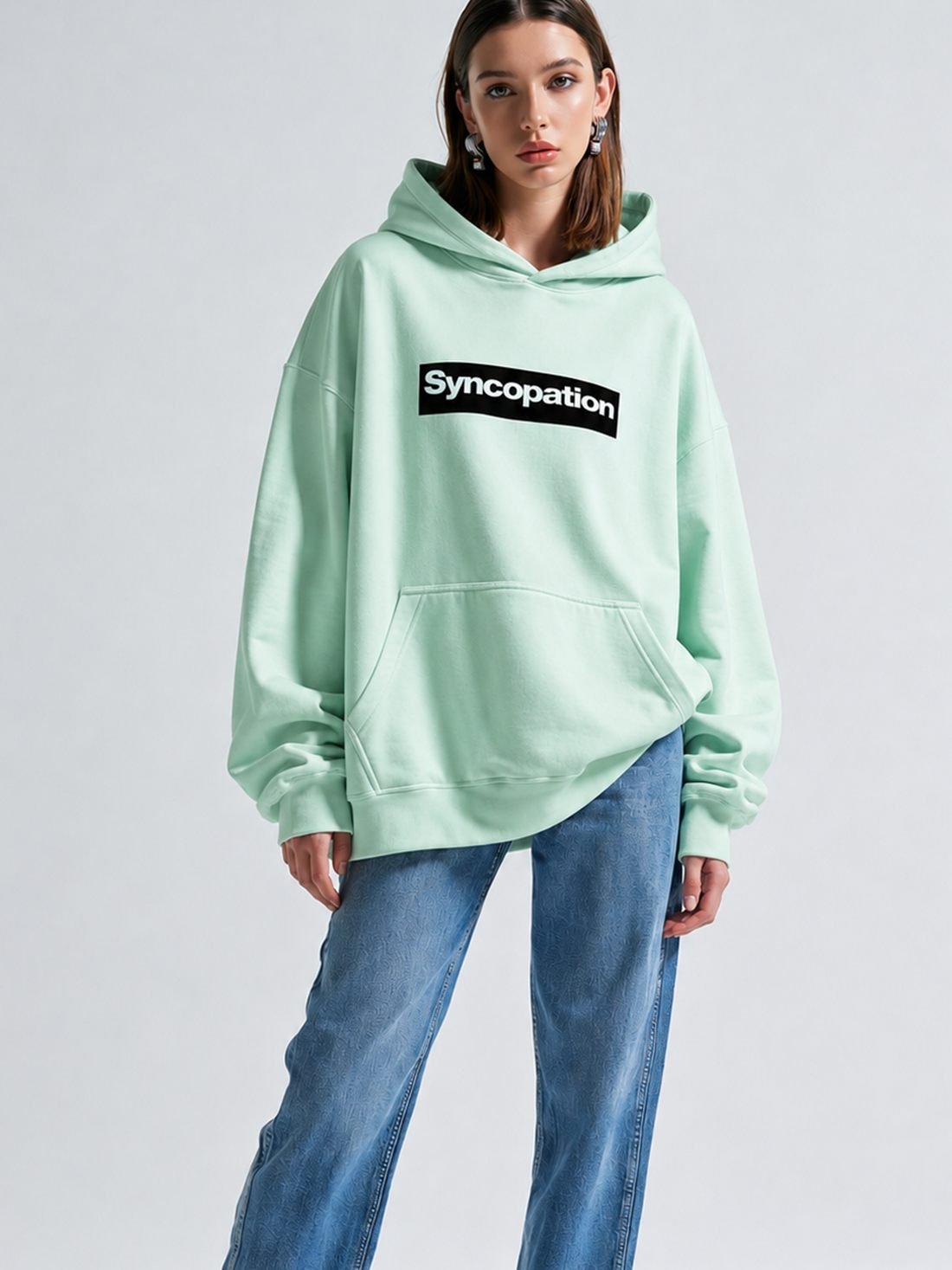 Box logo hoodie in mint green with a black box logo across the chest