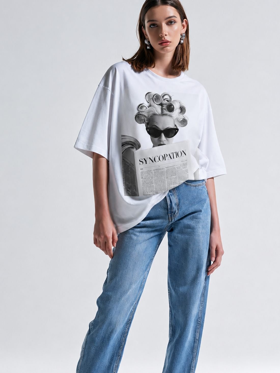 Newspaper tee in white with a monochrome newspaper print across the chest